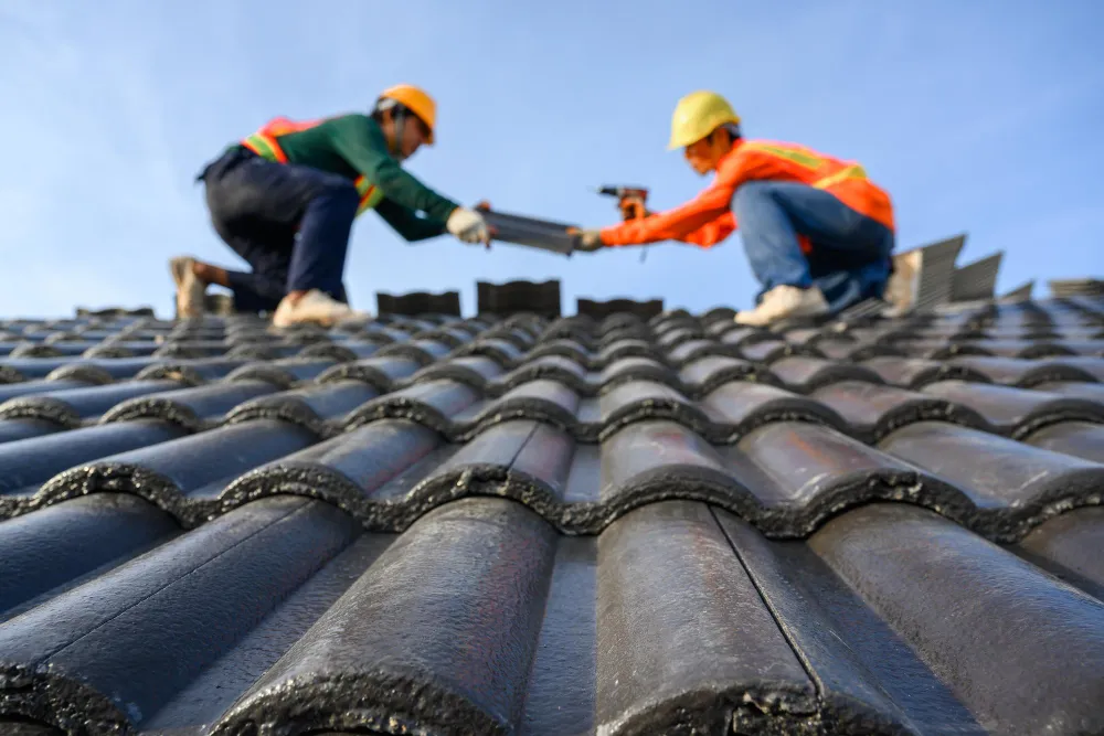 Roofers on the roof