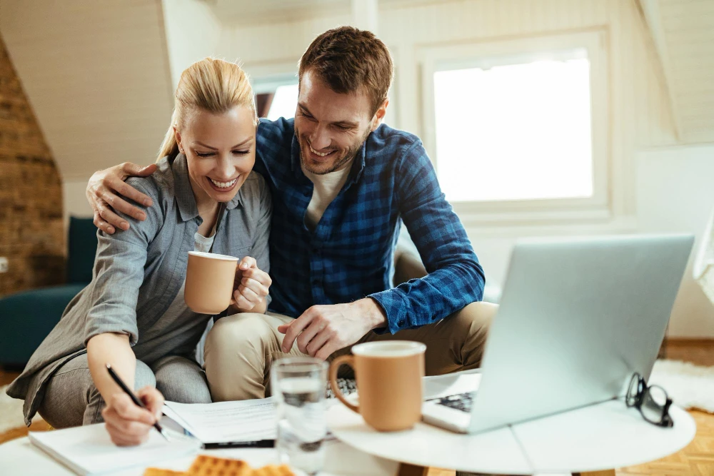 Young couple reviewing mortgage documents